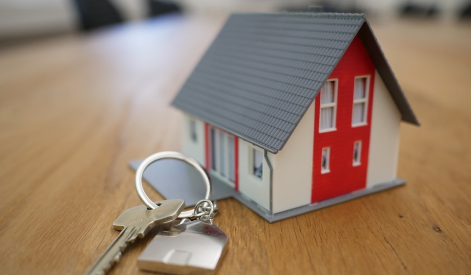 House keys and model representing inherited property